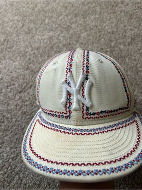 New Era Cream Kids Cap with Red and Blue Embroidered Accents